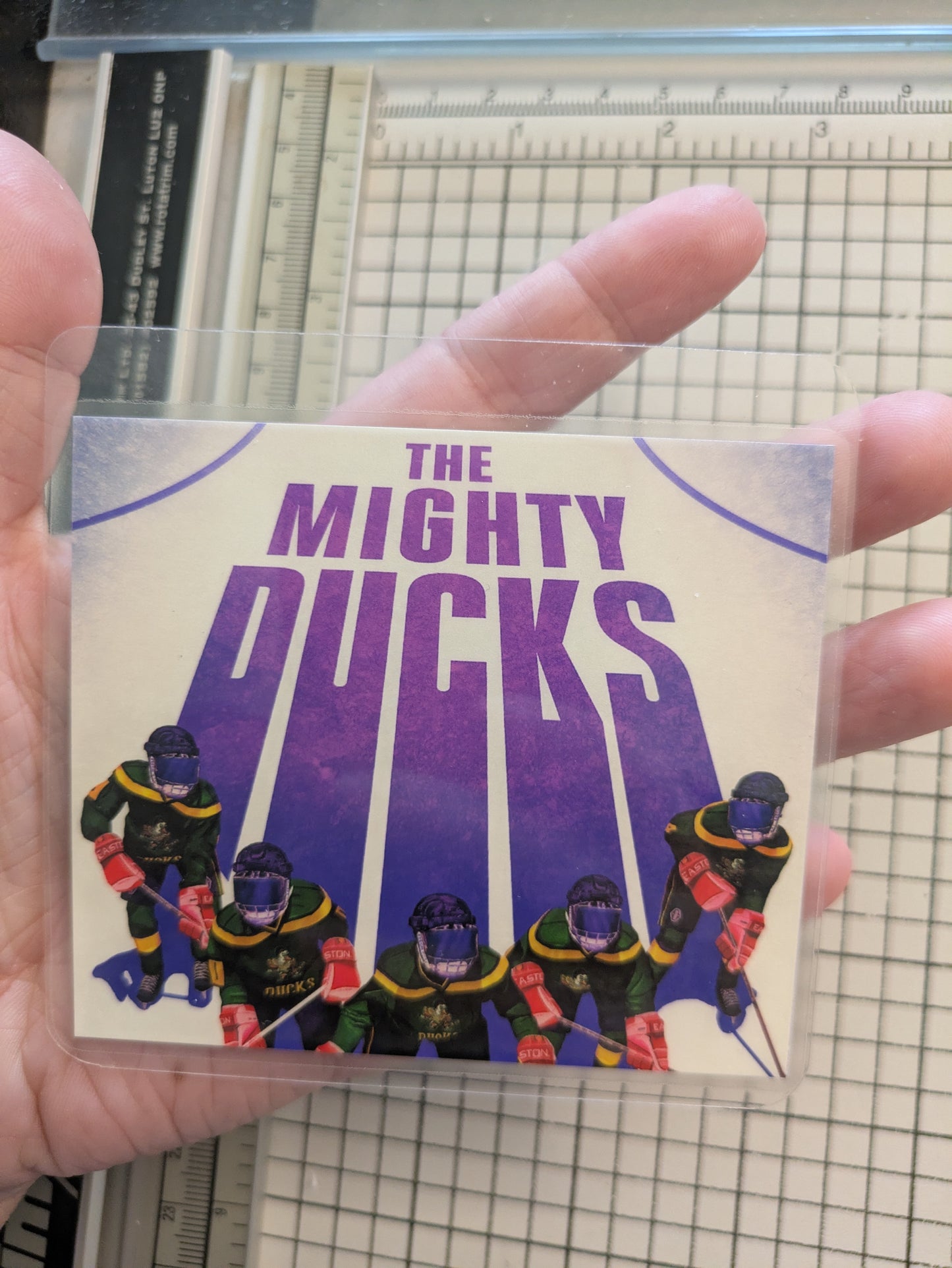 And image of the new badge insert design, it's is a rectangular image laminated